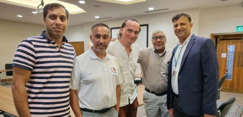 A garment manufacturing sector and Leic City Council meeting in August 2023. Pictured from left to right is Tejas Shah, Sajjad Khan, Deputy Mayor Adam Clarke, Bashir Ali and Sanjay Modhwadia.